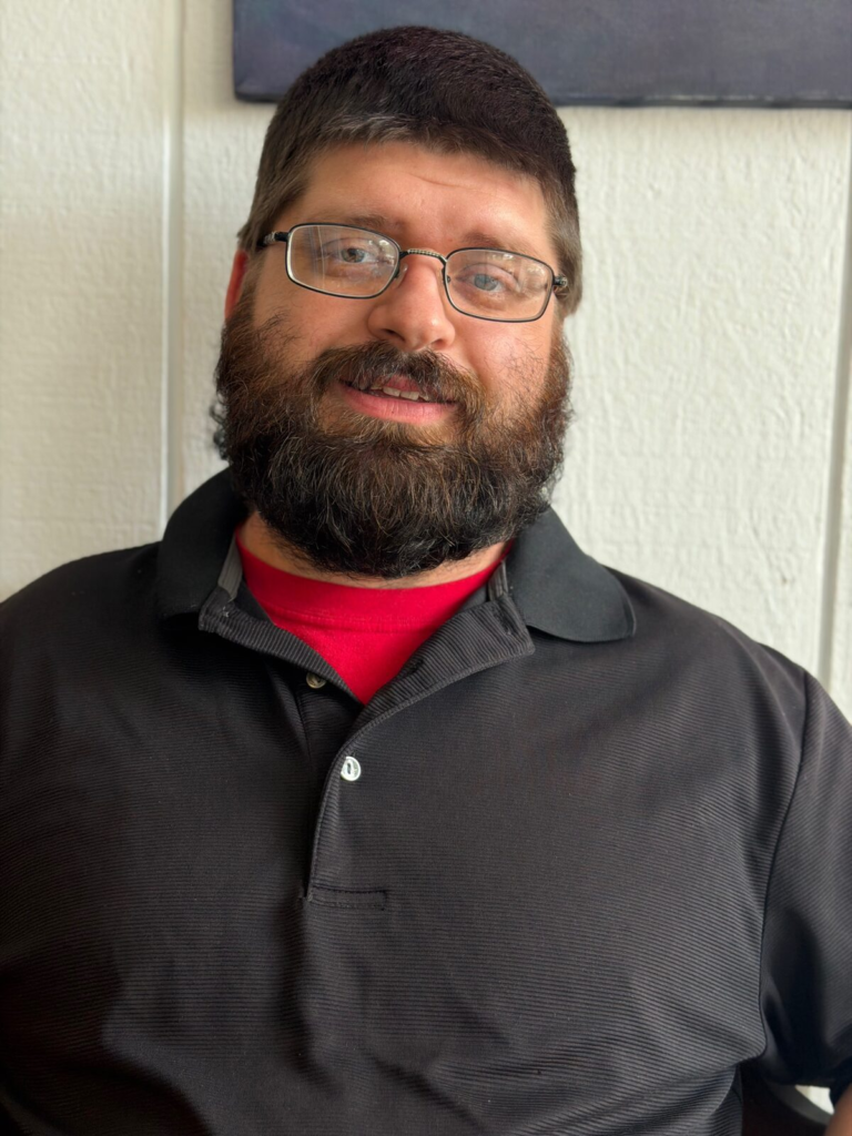 Nate Trong, owner of Northern Mobile Repair, photographed outside in Williamstown, Massachusetts